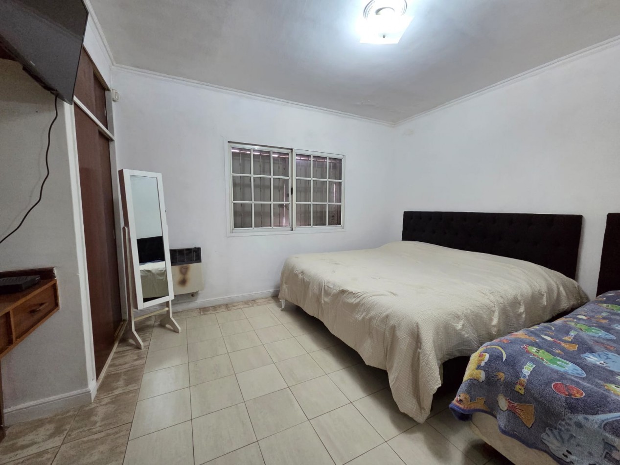 VENTA CASA CUATRO AMBIENTES PILETA COCHERA PARQUE QUINCHO VILLA DE MAYO